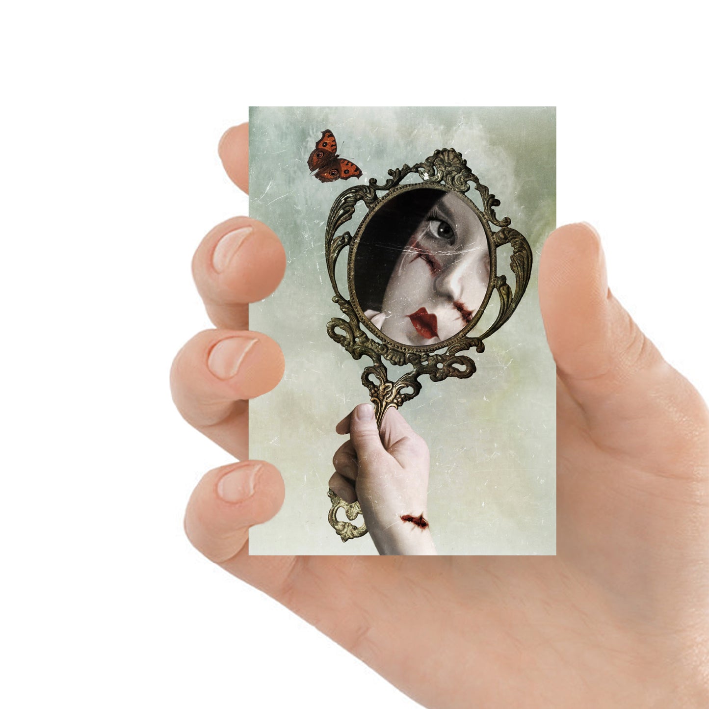 ACEO art card featuring a reflection of face in mirror, held in hand to showcase the miniature size and Lowbrow design.