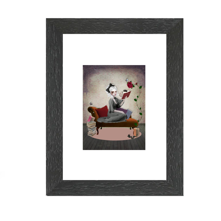 Artist Trading Card in a frame featuring a girl whose imagination knows no bounds. With every book she opens, a fantastical world comes to life.
