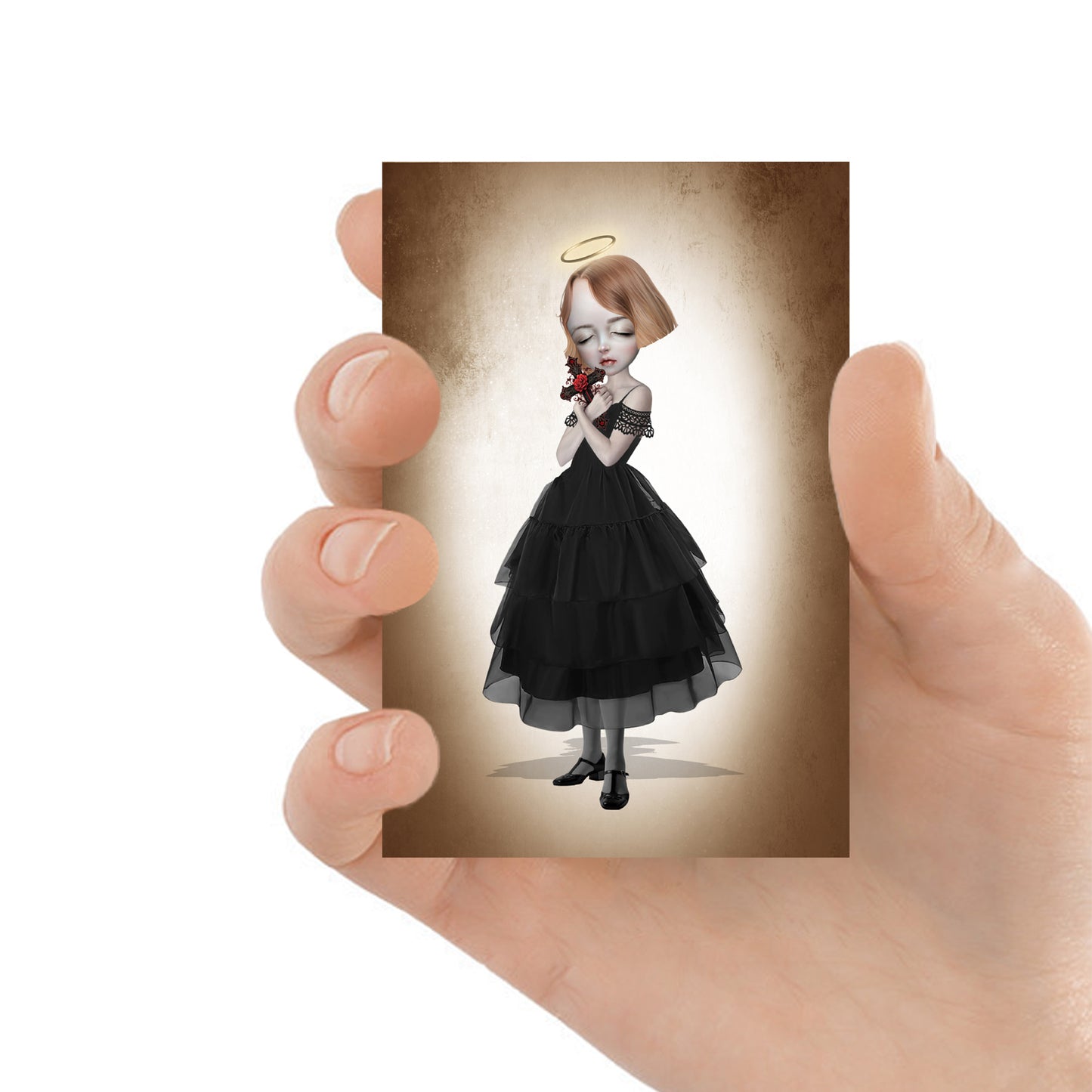 ACEO art card featuring a girl with crucifix, held in hand to showcase the miniature size and spiritual design.