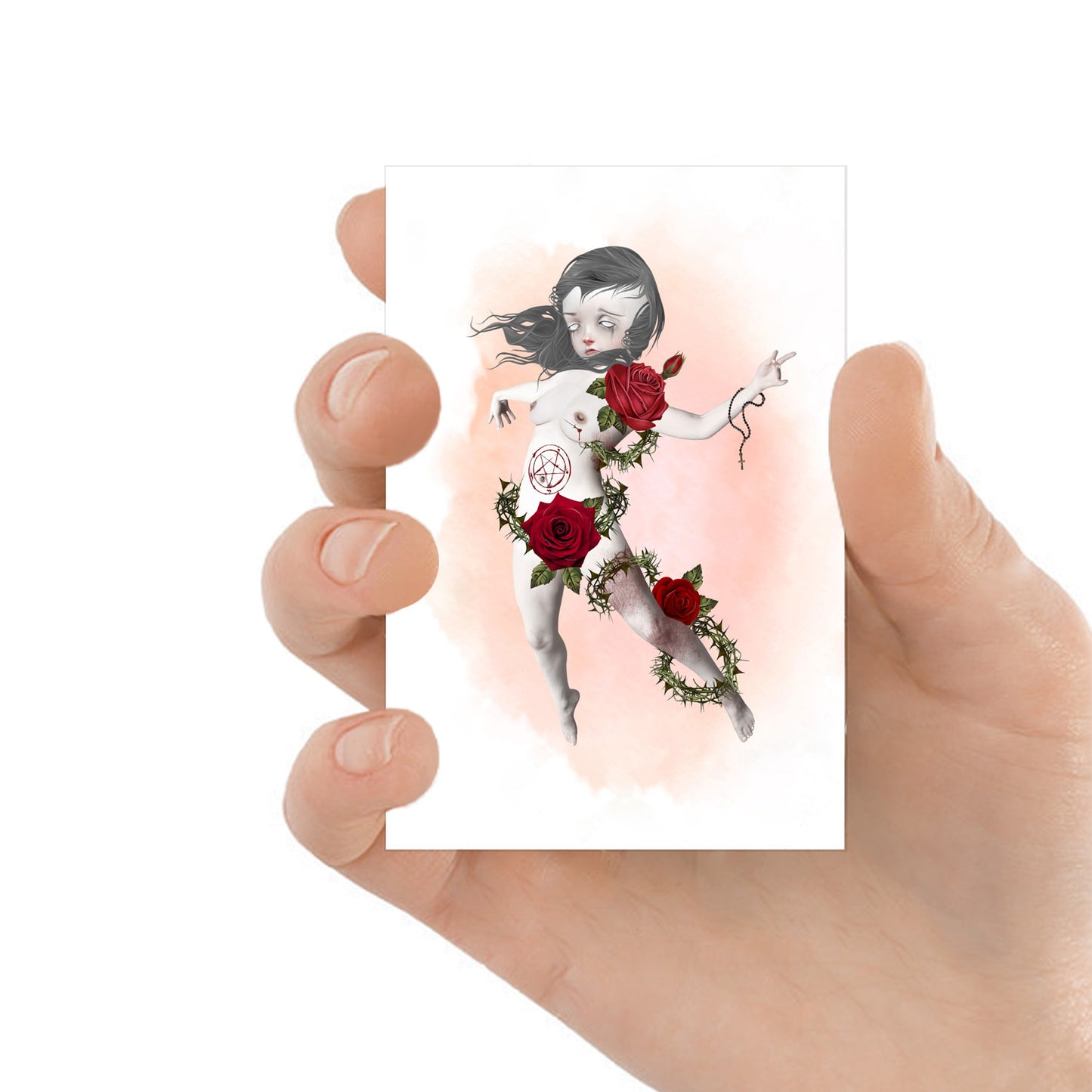 ACEO art card featuring a possessed girl held in hand—creepy cute gothic art style with dark, macabre elements.