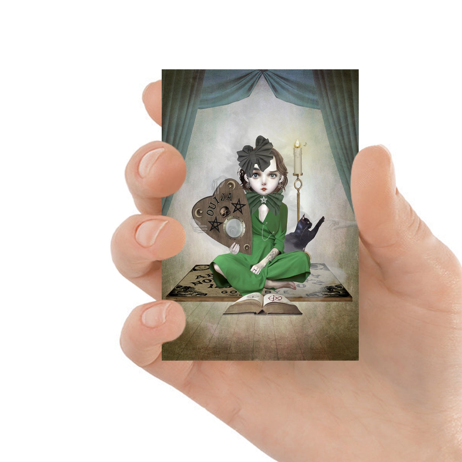ACEO art card featuring a seance, held in hand—creepy cute gothic art style with dark, whimsical elements.