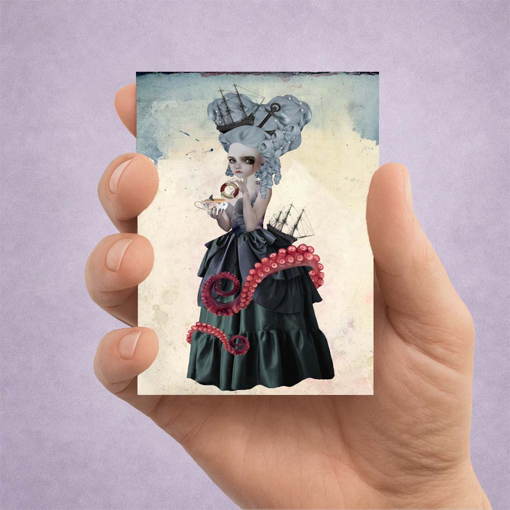 Hand holding an ACEO art card features Amphitrite, a sea goddess portrait with octopus tentacles and a tall ship
