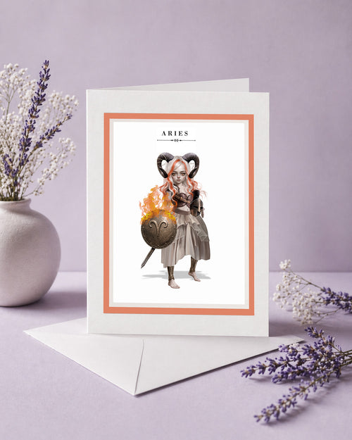 Aries zodiac birthday card featuring an illustration of a white and orange-haired warrior maiden with ram horns holding a flaming bronze shield.