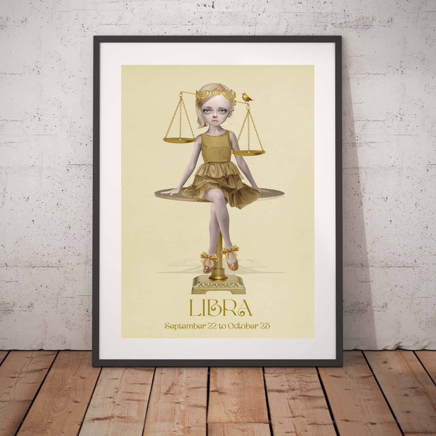 Libra girl star sign astrology art print in a black frame, standing against a white wall.