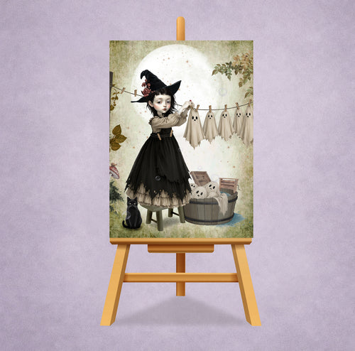 Miniature 2.5x3.5 ACEO art trading card displayed on a miniature display stand of a gothic witch girl hanging sheet ghosts on a clothesline.