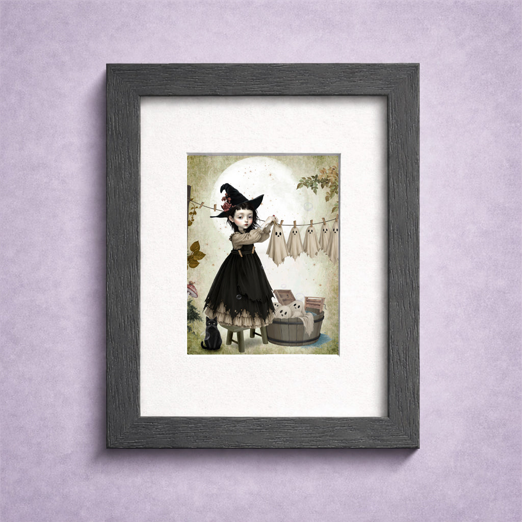 Miniature 2.5x3.5 ACEO art trading card in a frame of a gothic witch girl hanging sheet ghosts on a clothesline