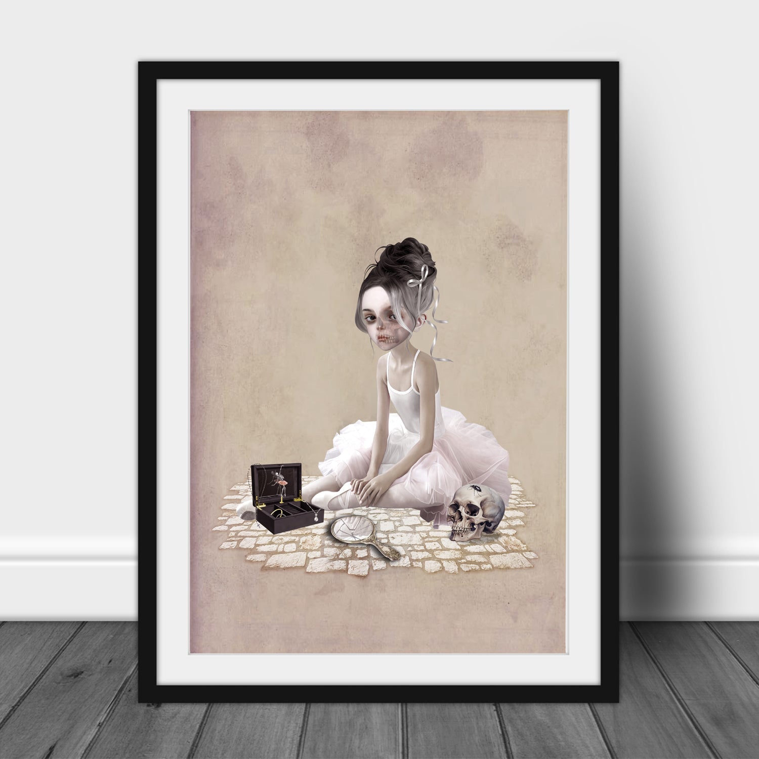 Framed artwork of a ballerina in a white dress with a skull on a textured beige background.