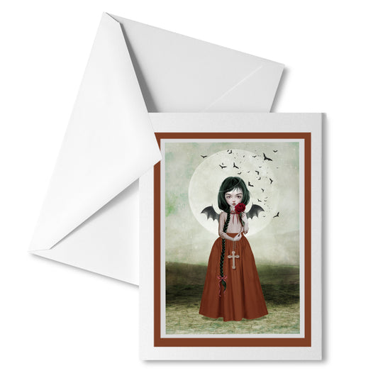 Gothic fantasy greeting card featuring Batgirl with a crucifix under the moonlight, paired with a white envelope. Perfect for sending a unique dark art message.
