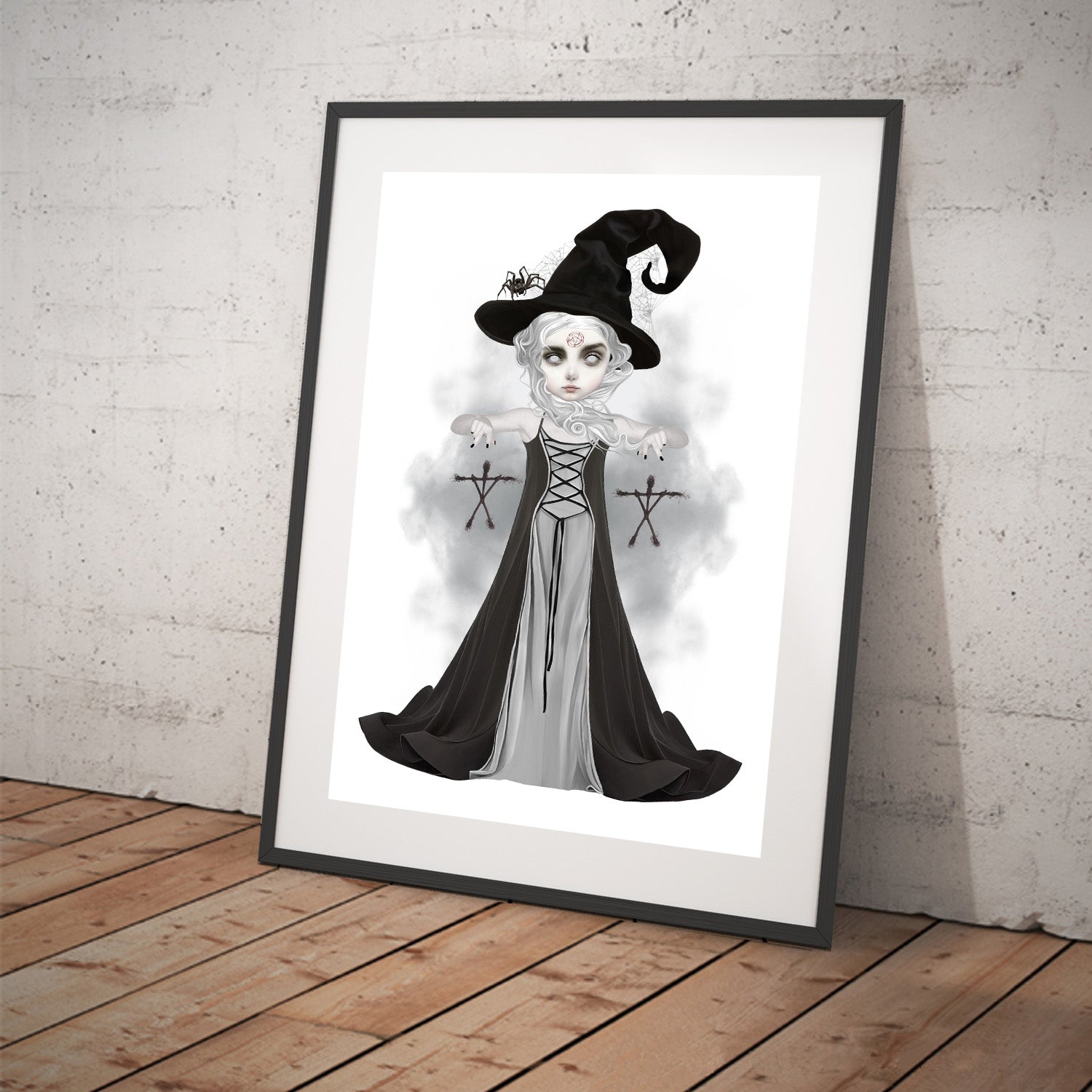 Art print featuring the blair witch displayed in a tilted frame for a stylish presentation. Perfect for creepy cute or gothic-themed decor.