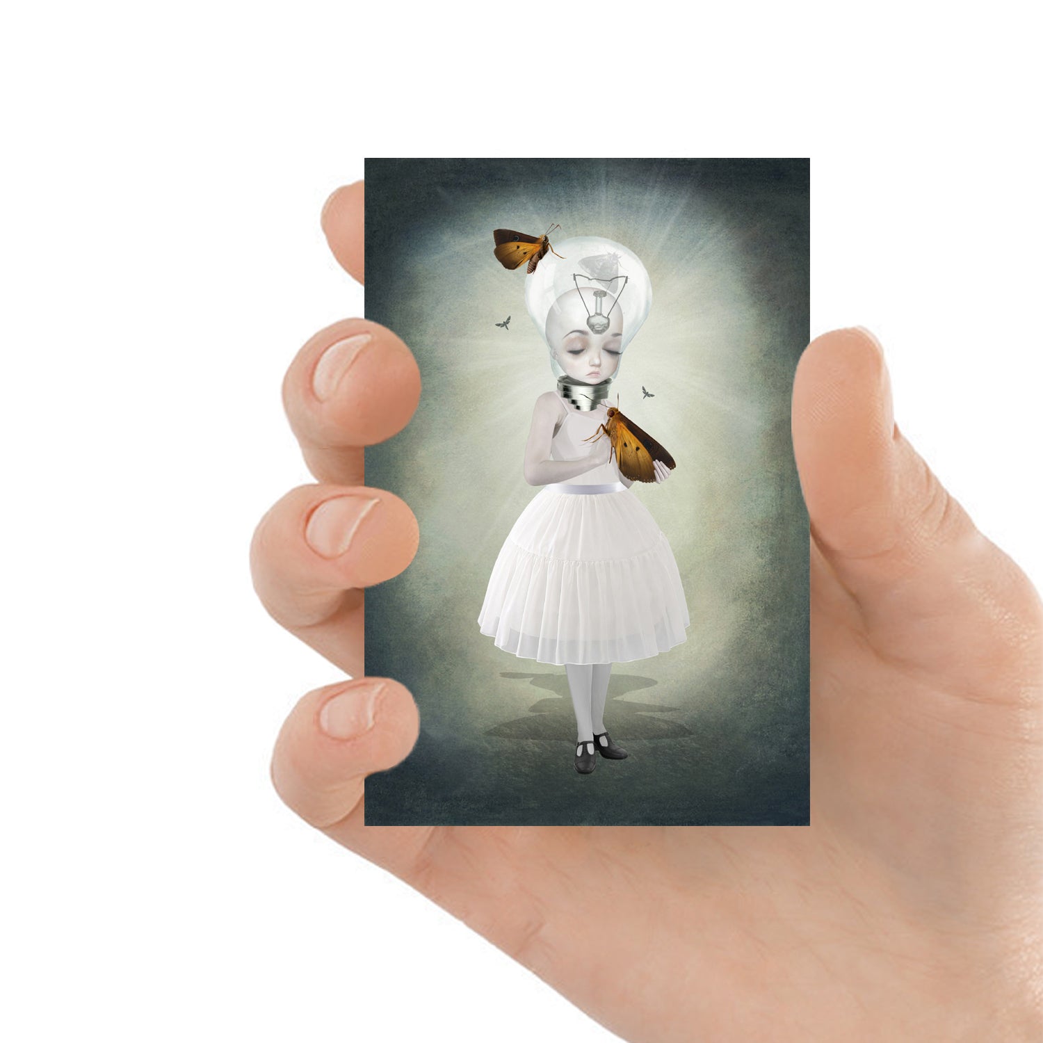 ACEO art card featuring a bulb girl and moths, held in hand—surreal fantasy art style with whimsical elements.