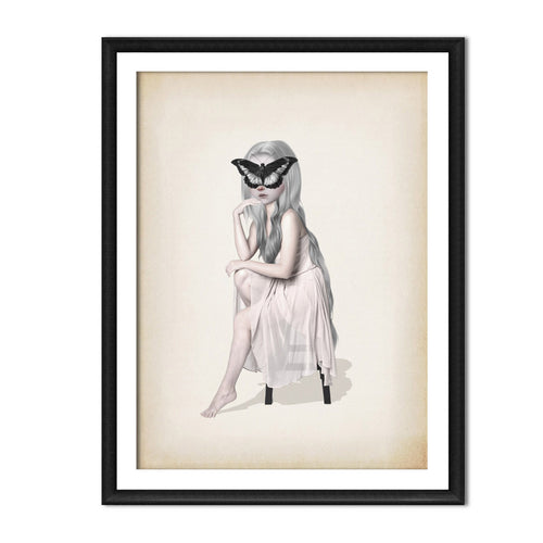 Black framed butterfly girl illustration hanging on a neutral wall.
