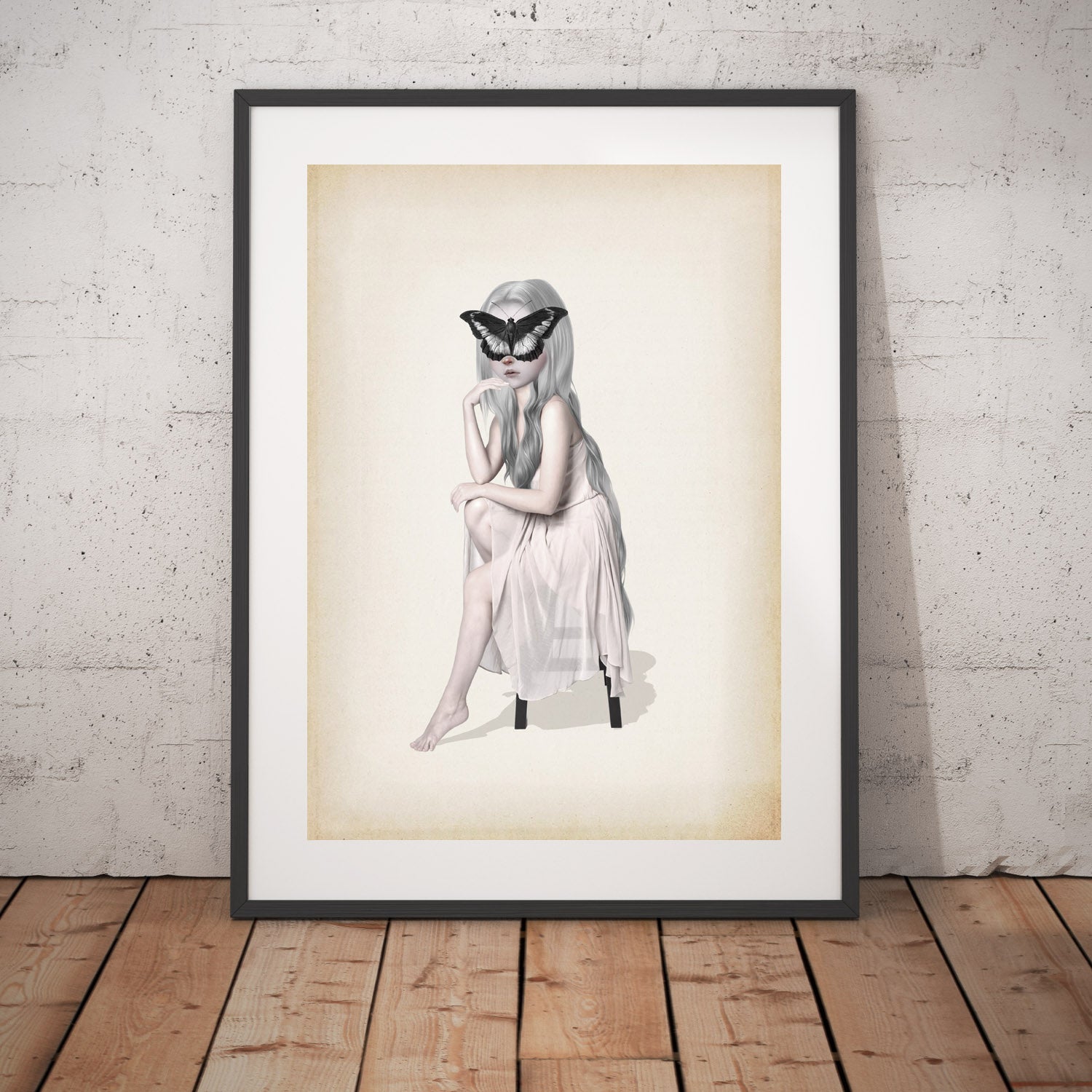 Surrealism Art Print depicts a dreamy girl in a flowing white dress, with a giant butterfly delicately resting on her face. 