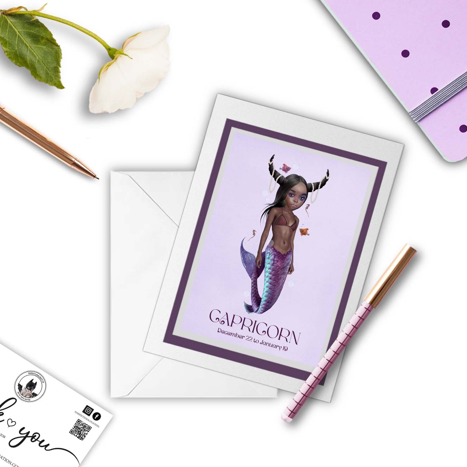 Capricorn girl star sign greeting card beside a notebook and pen – perfect for gifting or writing a poetic note.