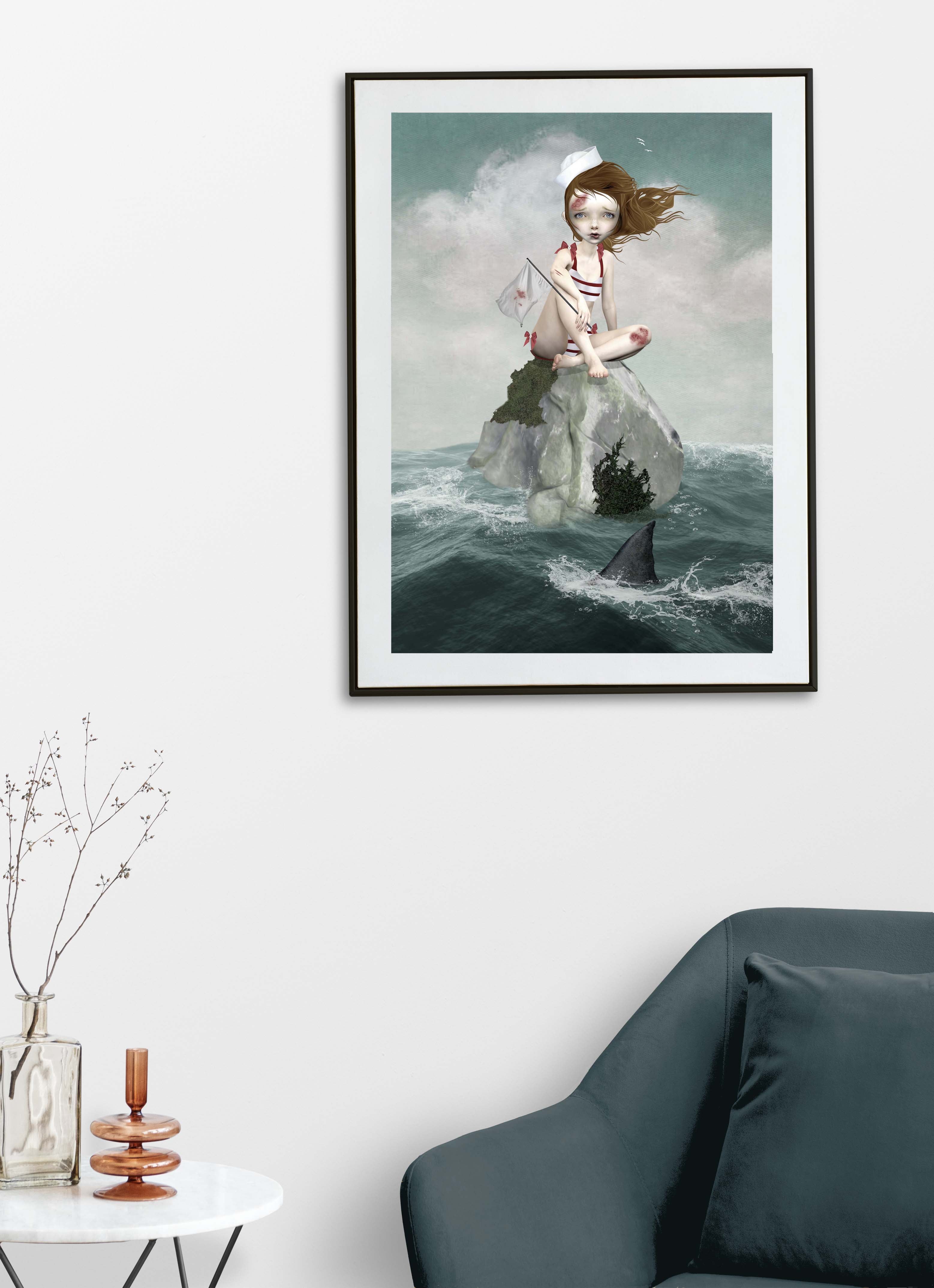 Framed artwork of a sailor girl on a rock stranded in the ocean, with shark lurking - displayed in a living room.