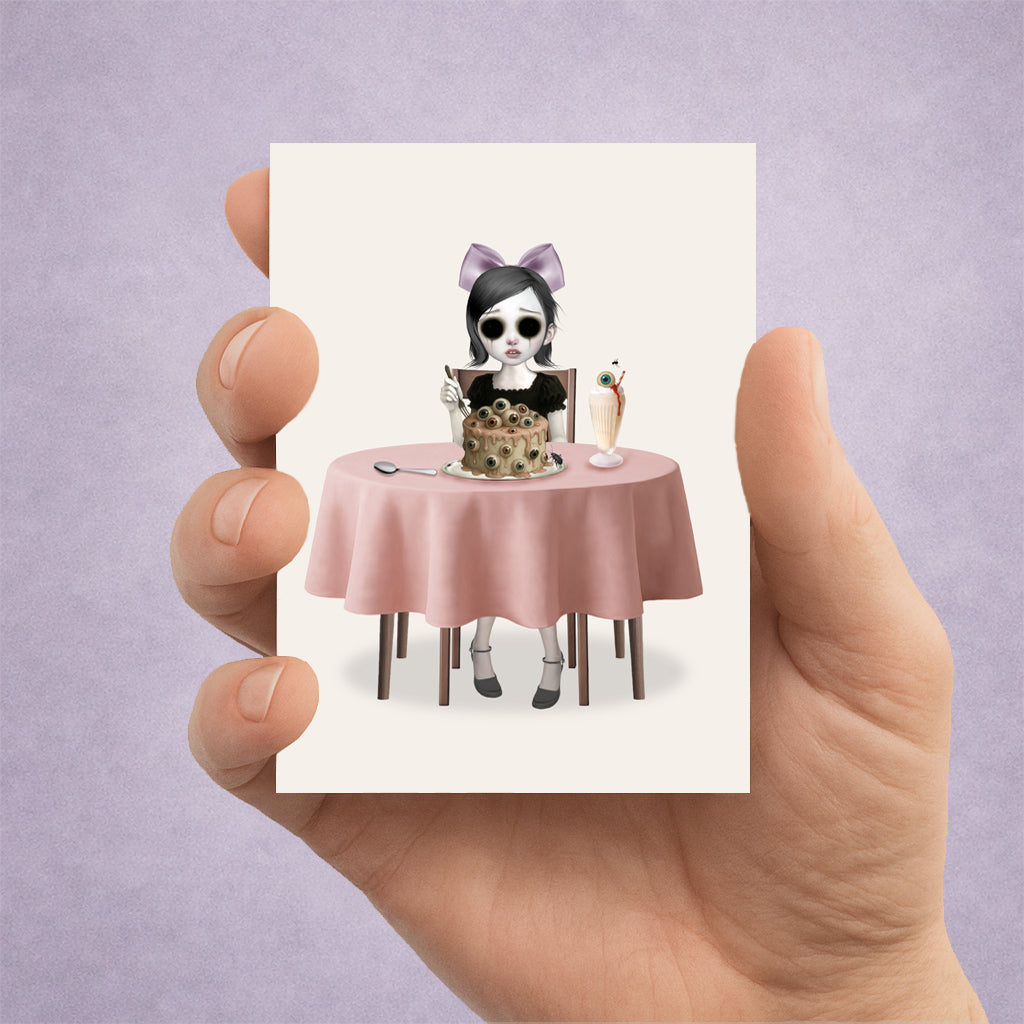 Creepy Cute Eyeball ACEO Card held in a hand to show miniature scale.