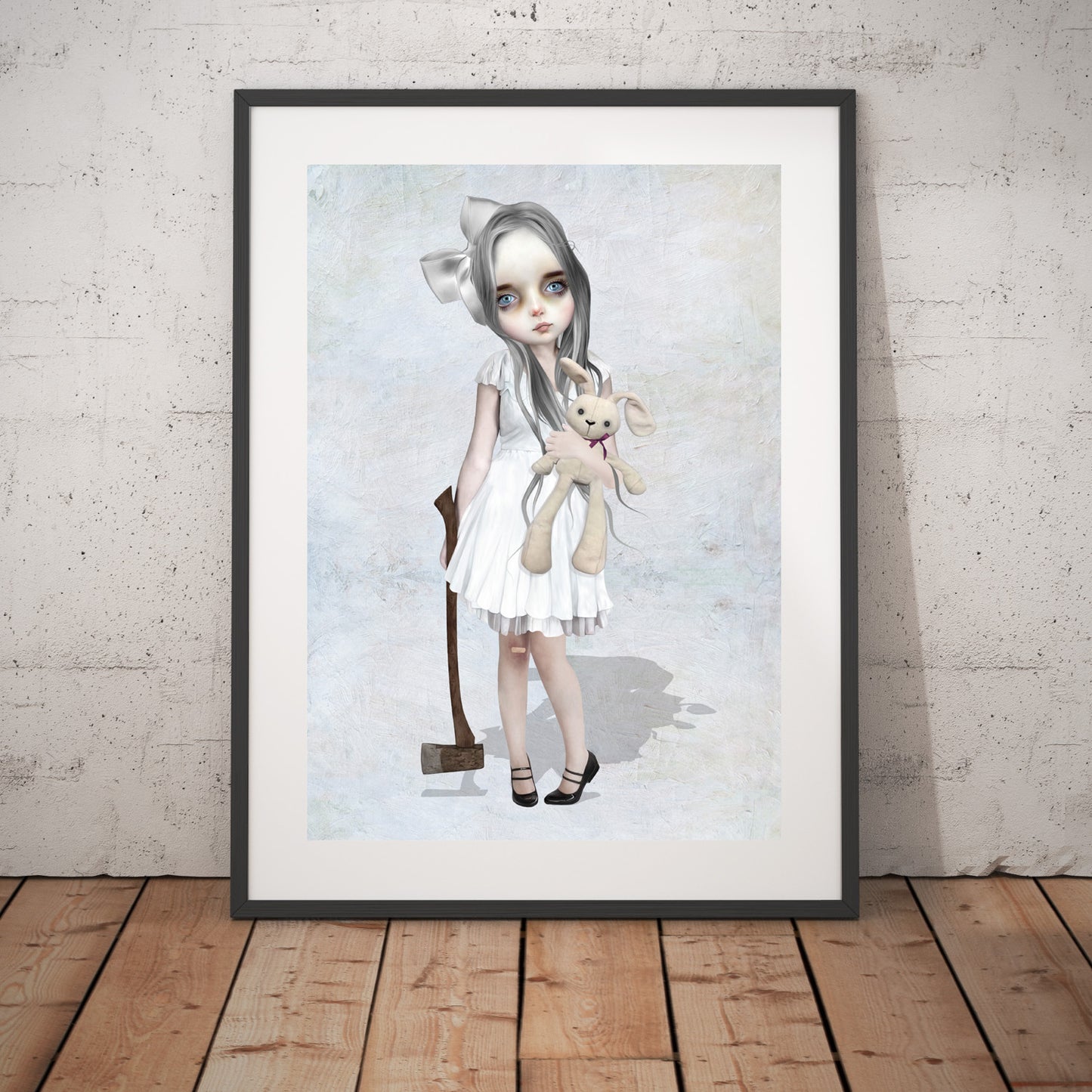 Surreal art print of a girl with axe and bunny doll framed in black and hanging on a modern living room wall.