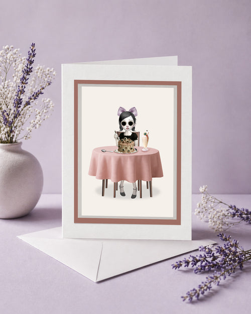 Greeting card with an eyeless girl at a table with eyeball cake on a purple background.
