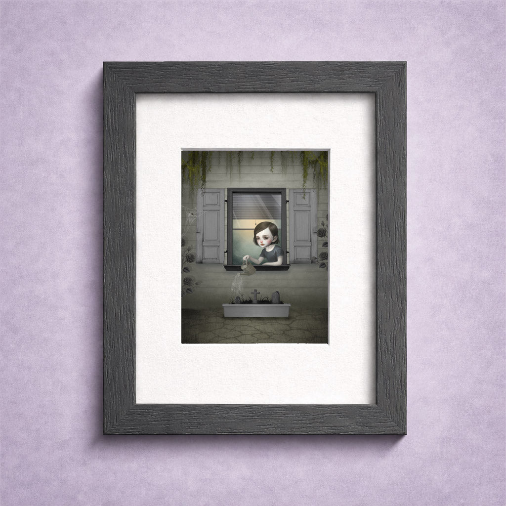 Framed  creepy cute miniature print of a gothic girl watering graves,