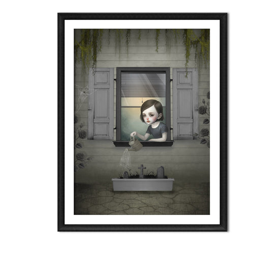Dark surrealism girl window art print  in an A4 frame featuring a gothic girl watering a miniature graveyard planter with roses.