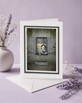 Dark surrealism girl window greeting card & envelope  and creepy cute gothic note card of a gothic girl watering graves.