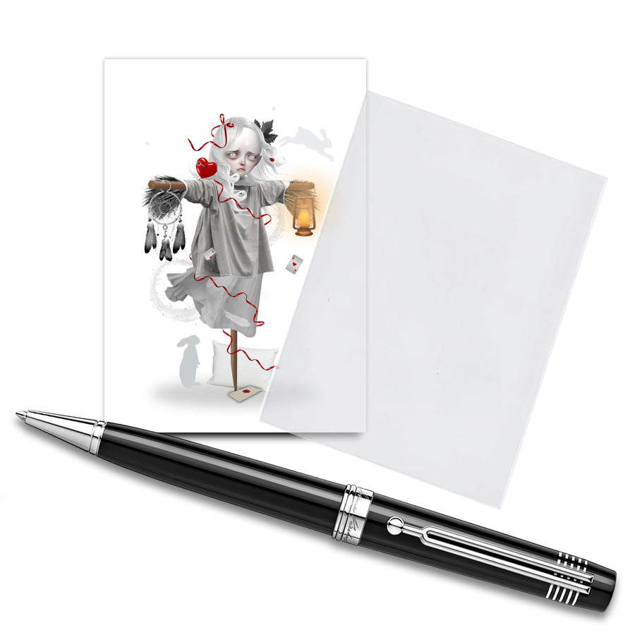 The ACEO card features a dream scarecrow, displayed in a clear protective sleeve with a pen for size comparison. It showcases dreamy, whimsical artwork.
