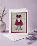 Art Greeting card  featuring an illustration of a twin sisters blindfolded stood on a compass.