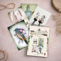 Fairy art postcard set featuring 4  fairy themed postcards.