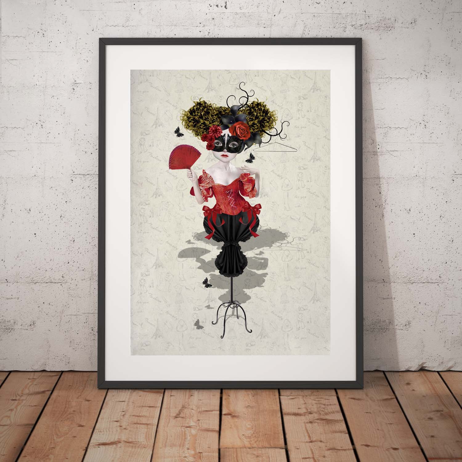 Fashion Mannequin art print in a black frame, standing against a white wall.