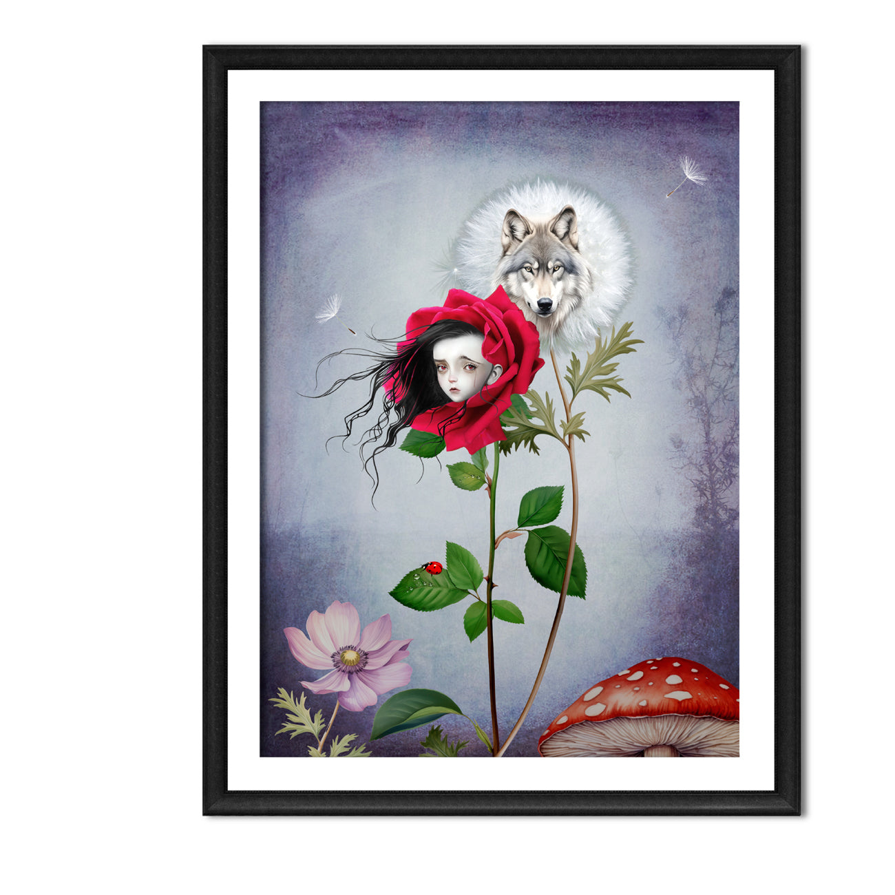 Floral Red Riding Hood & Wolf art print in a black frame, standing against a white wall.