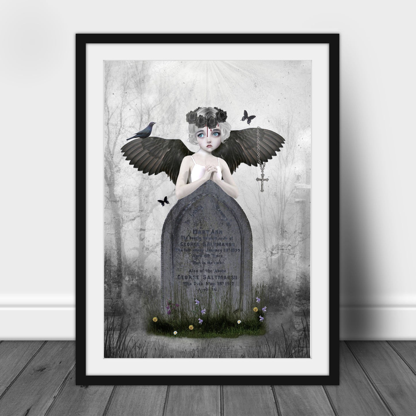 Framed dark fantasy art print, image is a fallen angel leaning on an headstone in a graveyard.