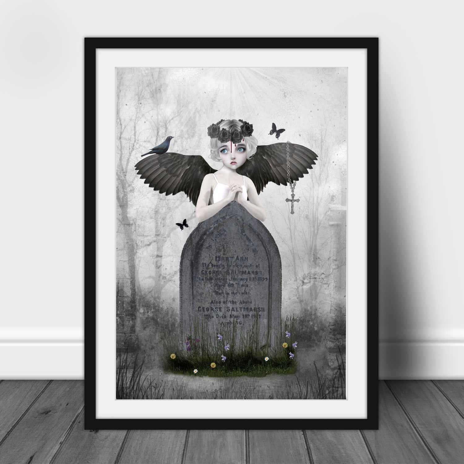 Framed dark fantasy art print, image is a fallen angel leaning on an headstone in a graveyard.