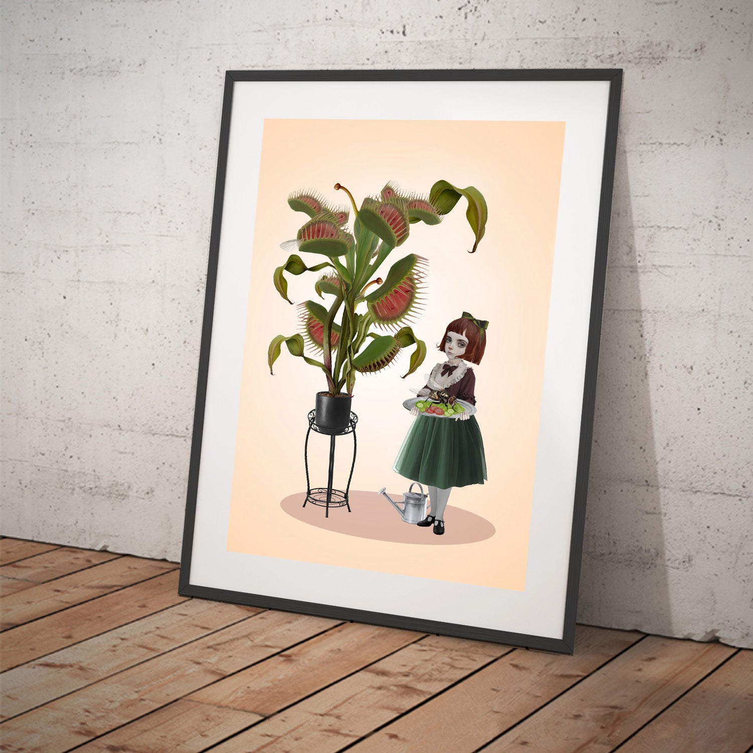 Carnivorous Plant Art print in a black frame. Featuring a surreal scene of a girl serving a giant fly on a platter to her Venus Flytrap
