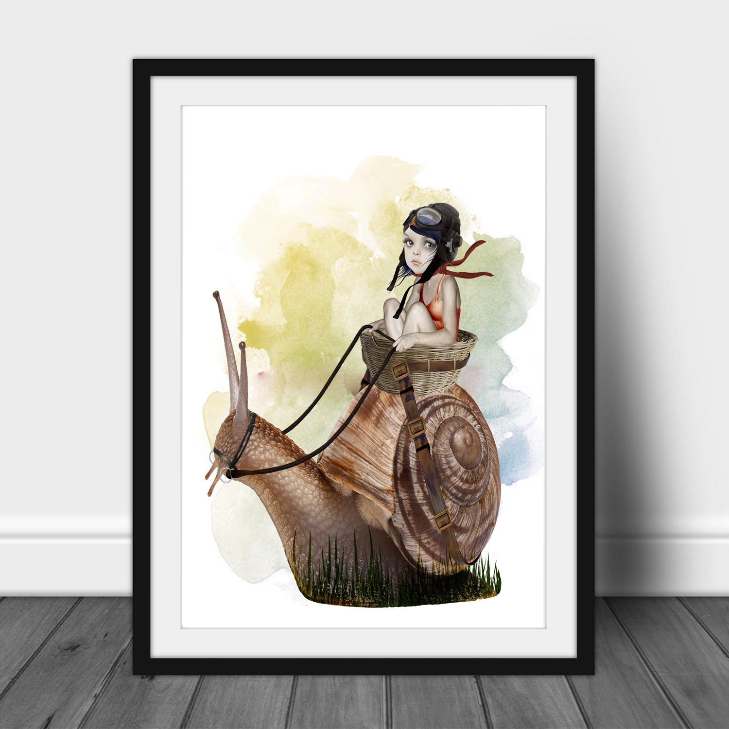 Framed Garden Snail Wall Art Print. This whimsical wall decor features an oversized garden snail with a playful girl riding on its back.