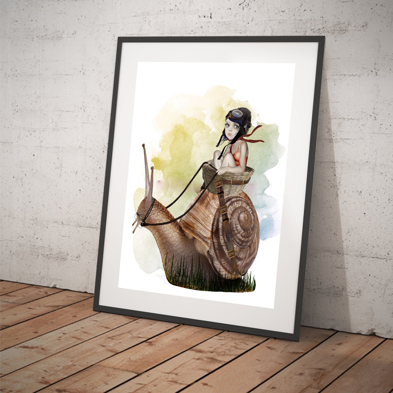 Garden Snail Art Print. This whimsical wall decor features an oversized garden snail with a playful girl riding on its back - in a frame for display.