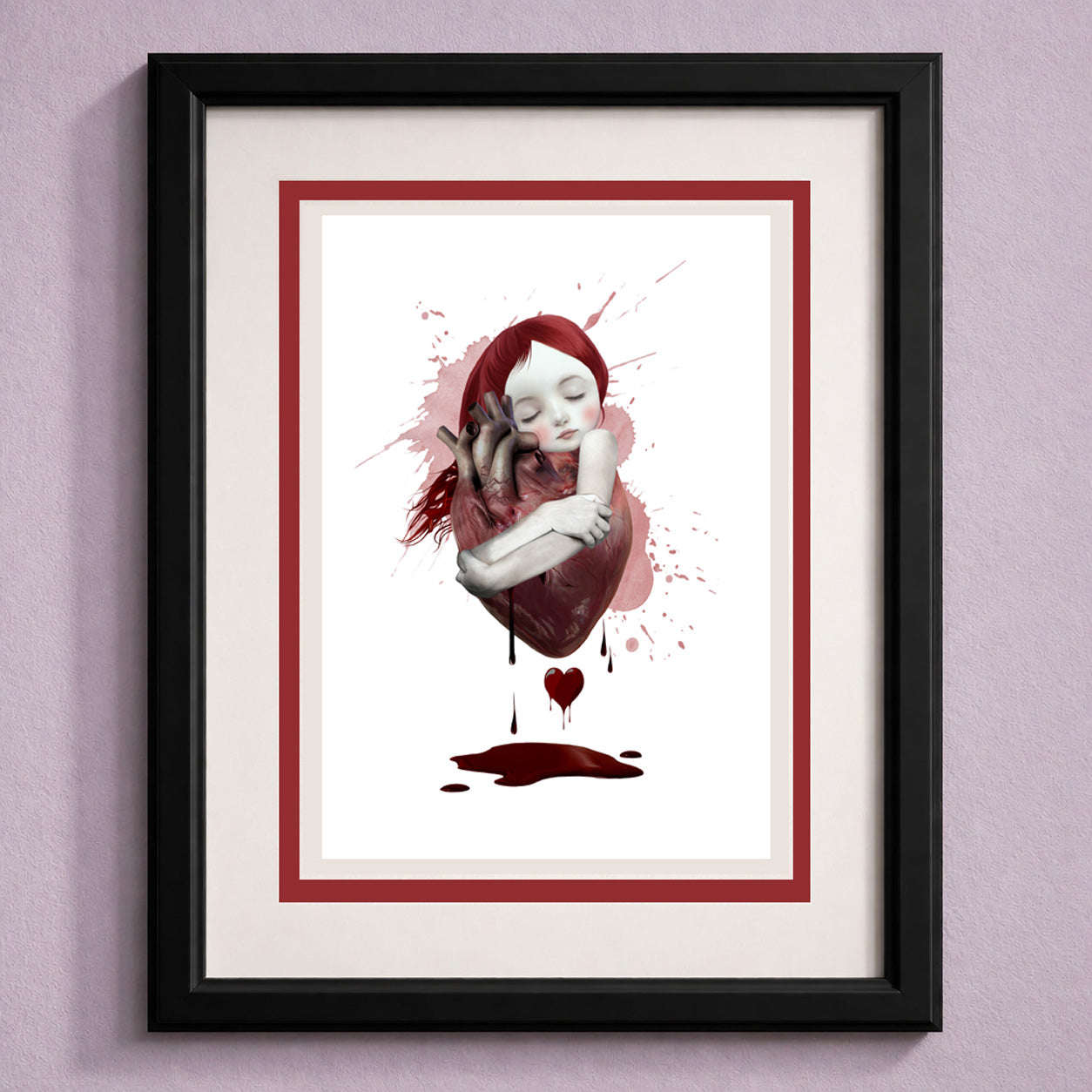 Surreal gothic greeting card by HarrietsImagination. Features a red hair girl hugging an anatomical heart—blank inside and ready to frame.