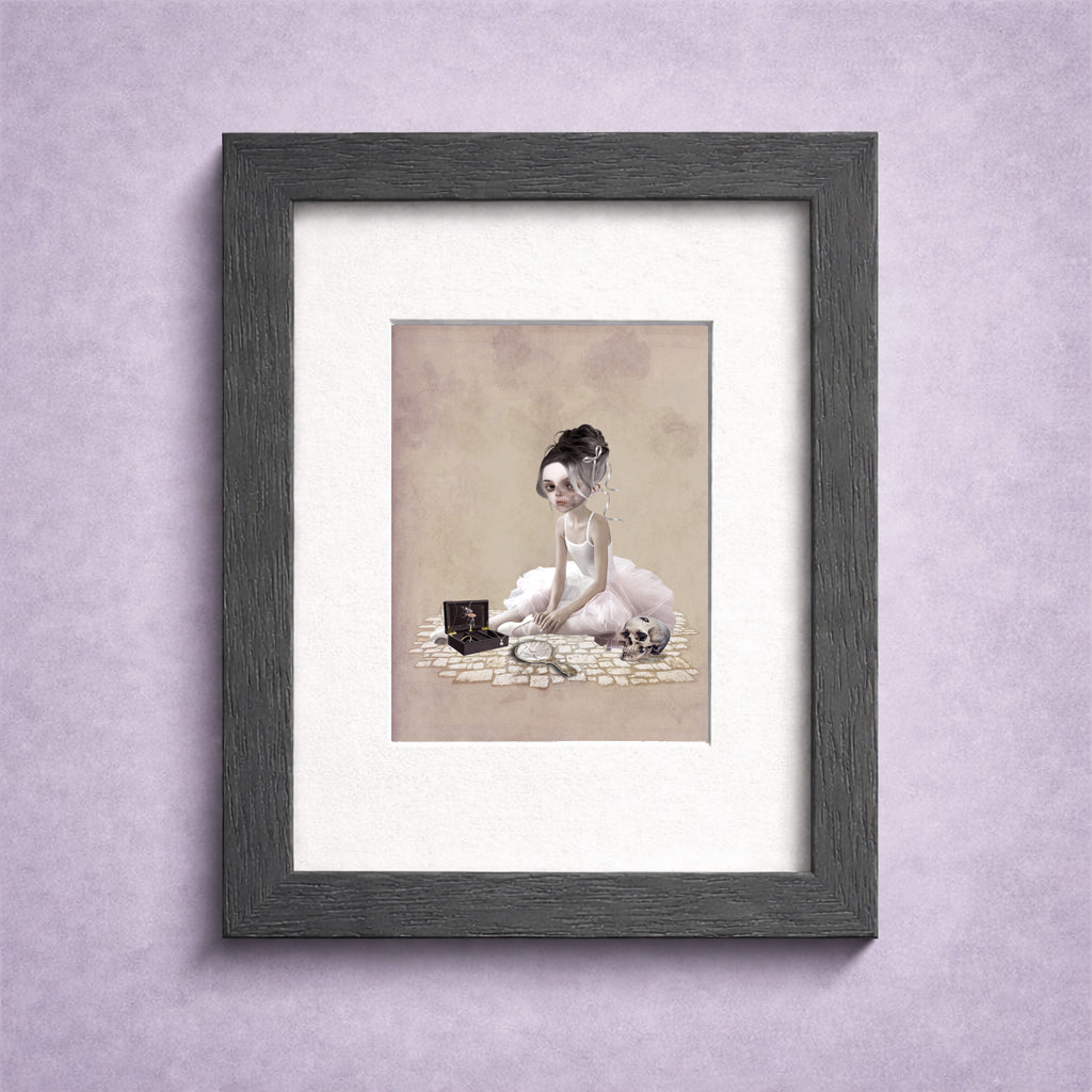 Framed artwork of a gothic ballerina with skull and music box.