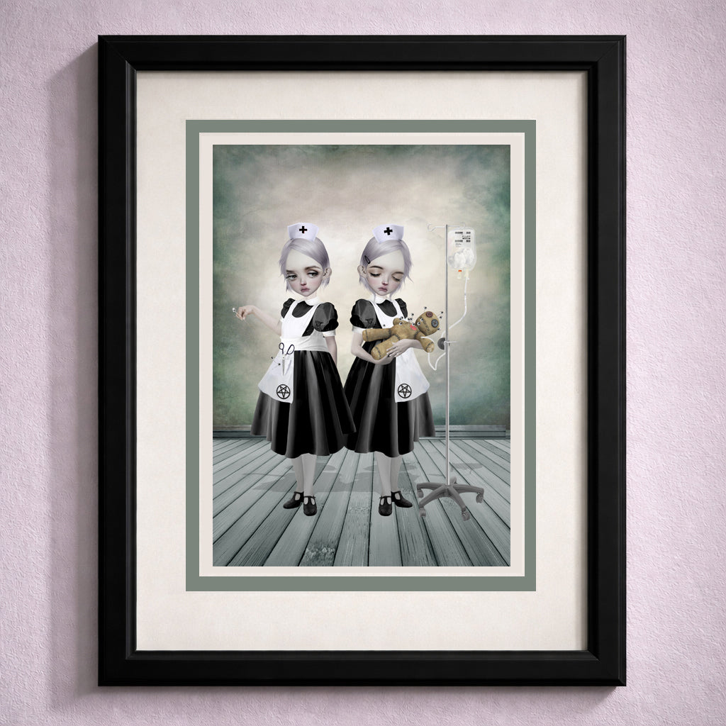 Framed art greeting card of two gothic nurses and voodoo doll.