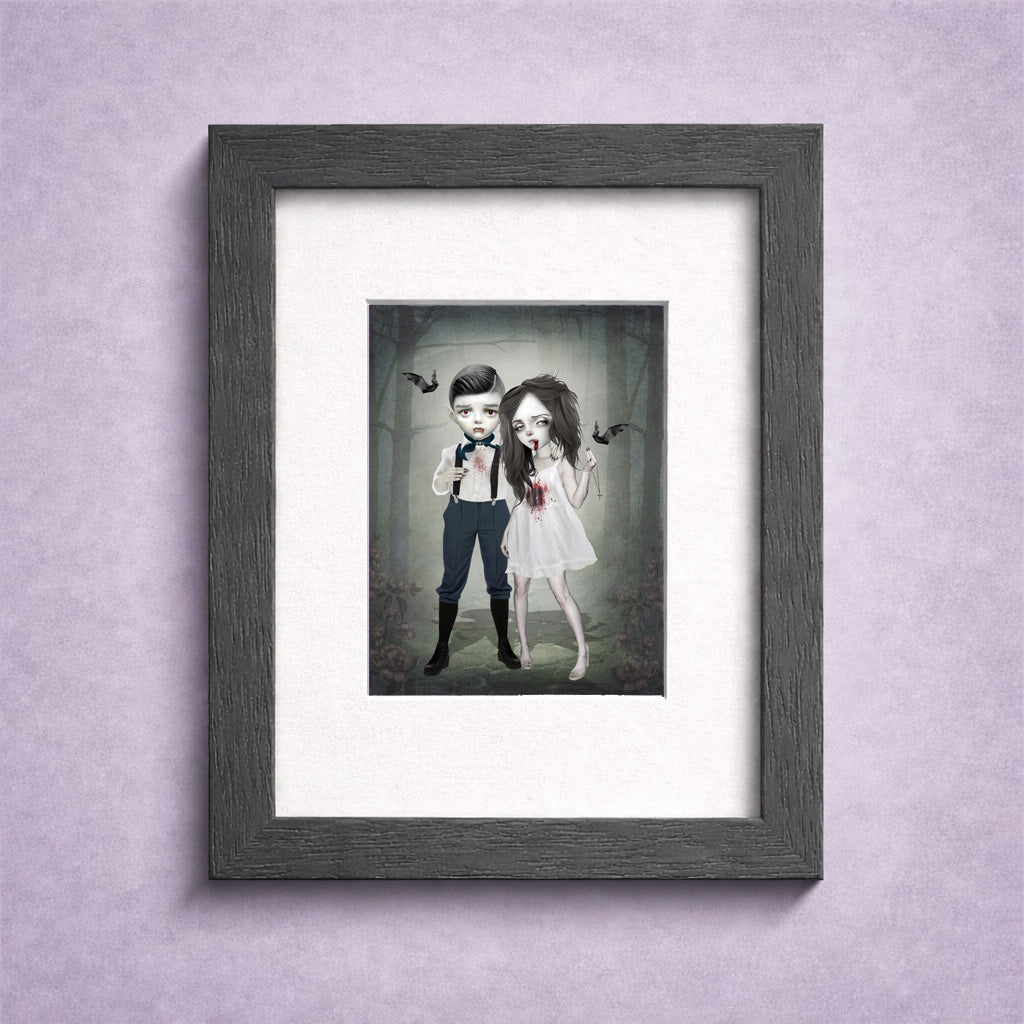 Framed ACEO artwork of a vampire couple in a dark, gothic setting on a purple wall.