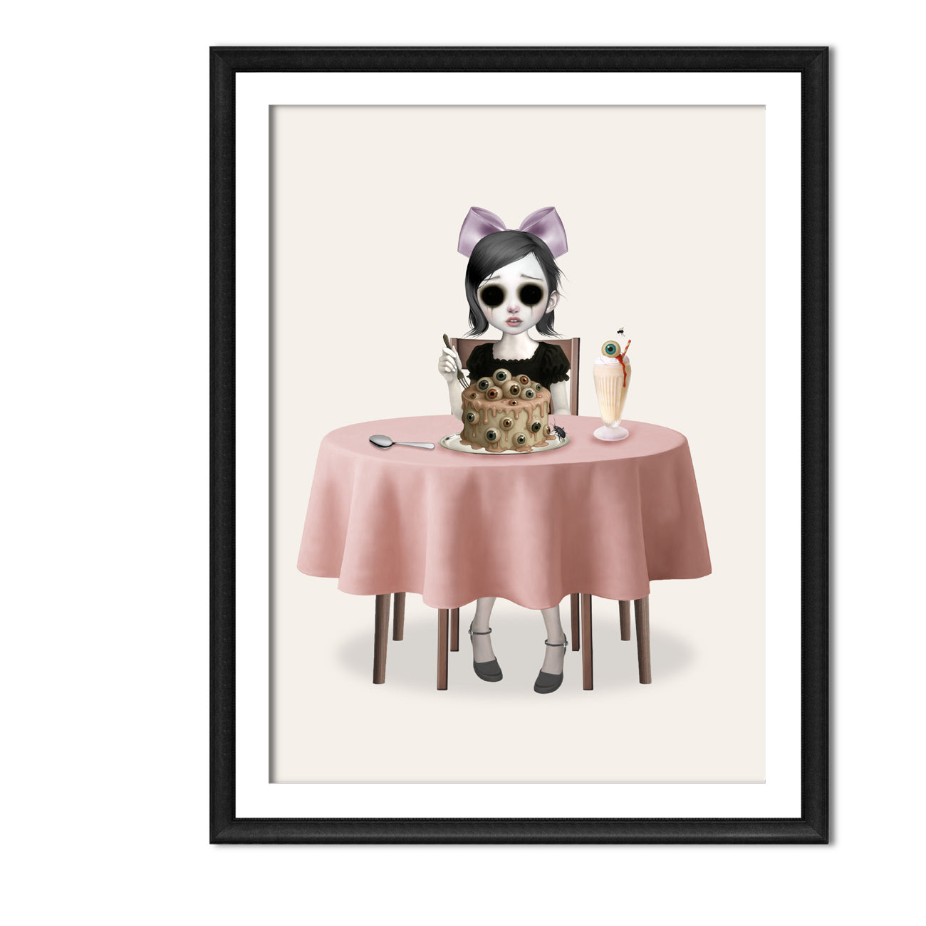 Black framed Pastel Goth art print hung on a white wall, showcasing the surreal "A Sight for Sore Eyes" illustration of a girl eating eyeball-themed desserts.