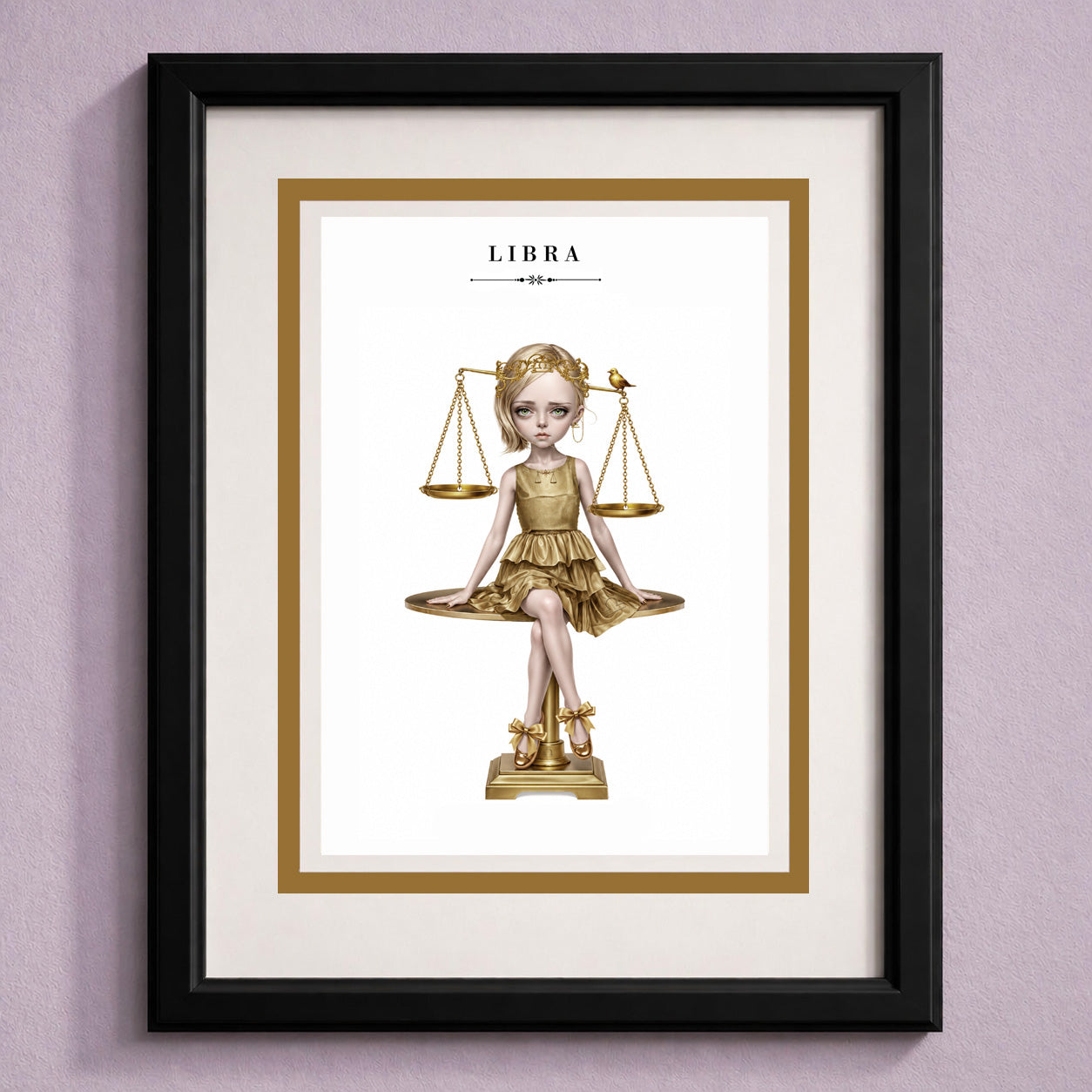 Framed Libra zodiac birthday card featuring an illustration of a blonde maiden in a metallic gold dress sitting atop a golden balance scale with a tiny bird.