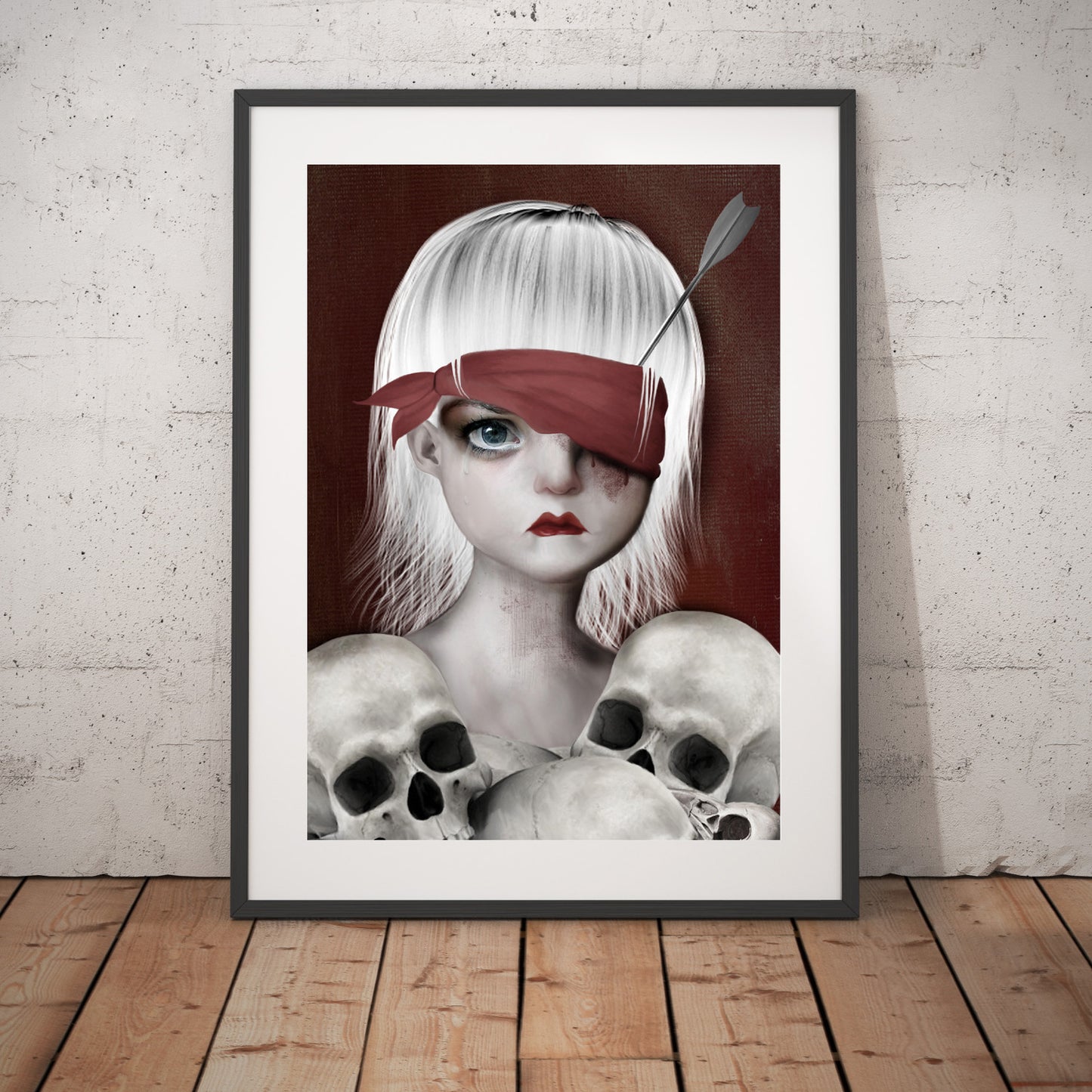 Memento mori wall art Print. Featuring a girl with an arrow in her eye surrounded by human skulls.