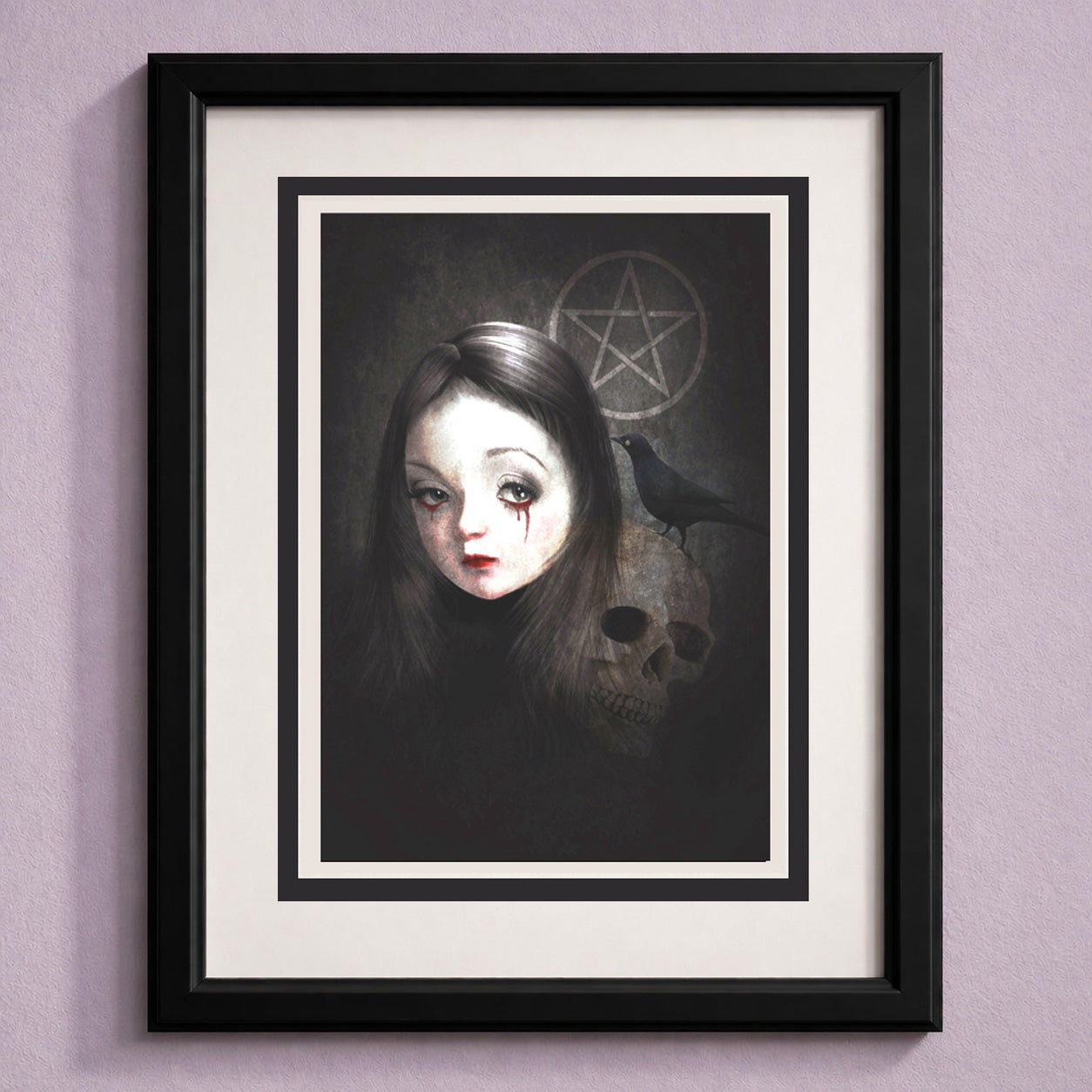 Framed Occultist dark gothic greeting card with white envelope, featuring a skull, blackbird, weeping girl, and pentacle laid on a lilac background.