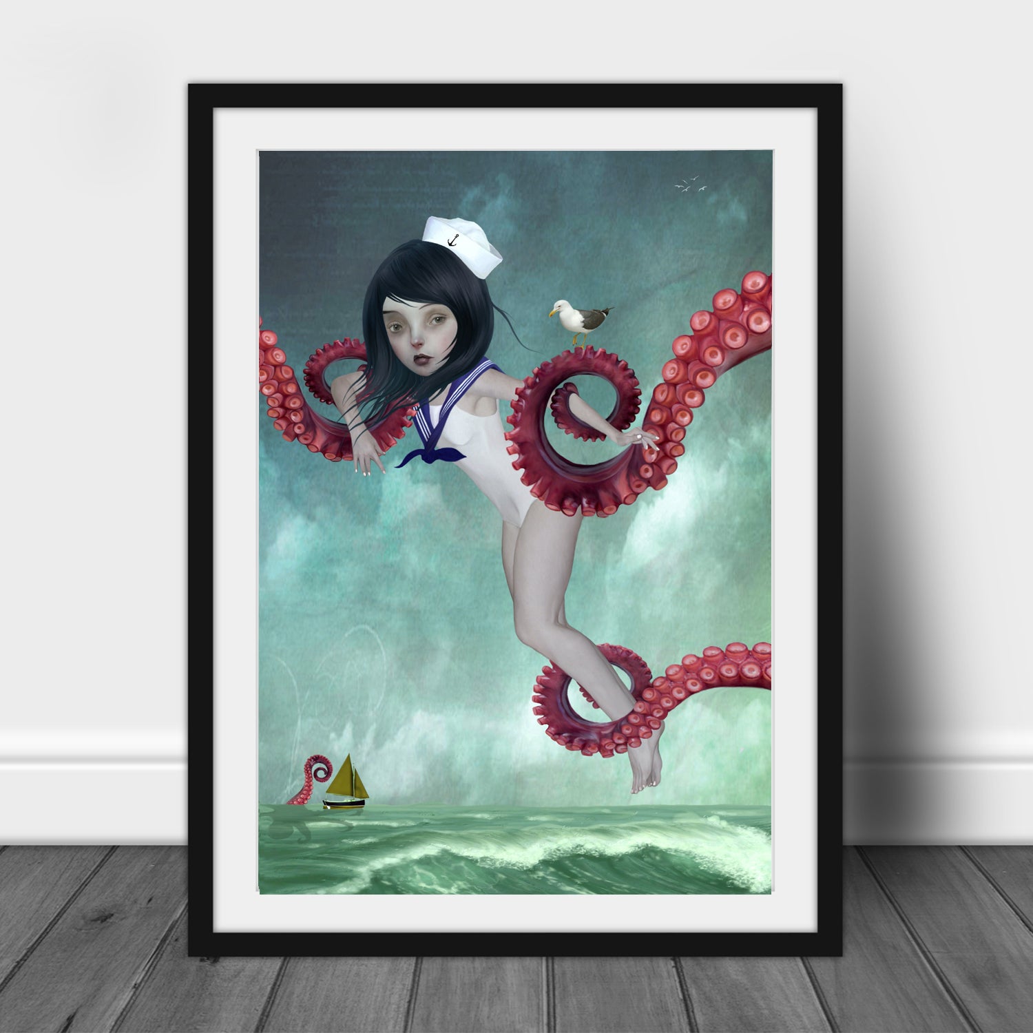 Framed art print of a sailor girl, surrounded by octopus tentacles, displayed in a black frame.