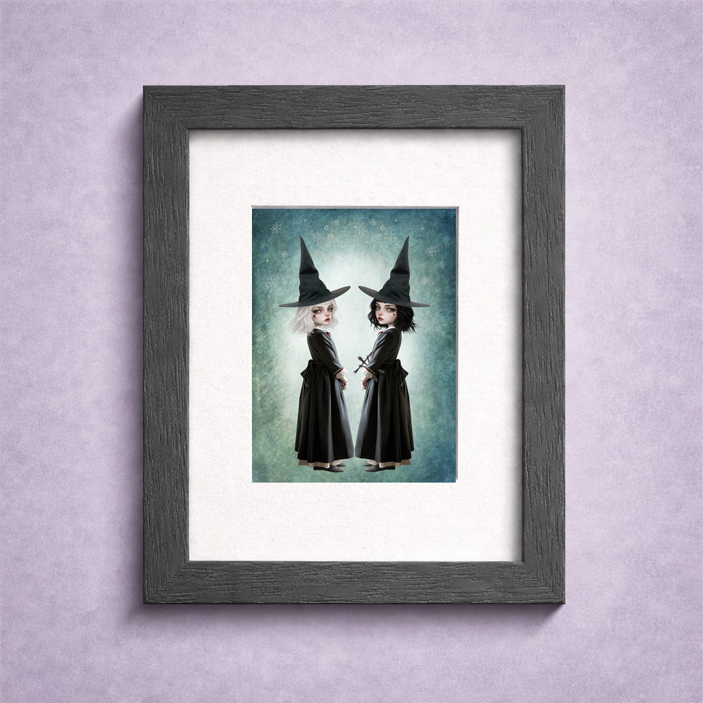 Framed ACEO art card, featuring twin gothic witches with white and black hair against a celestial teal background.