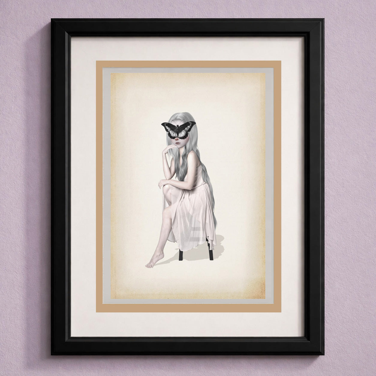 Framed art greeting card of a woman with butterfly on her face.