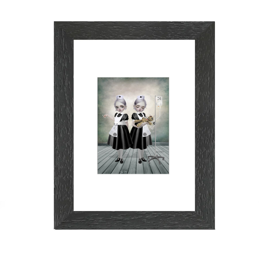 Framed  ACEO features two eerie yet charming nurses tending to a voodoo doll. One inserts pins with precision, while the other administers an IV of fluffy stuffing.