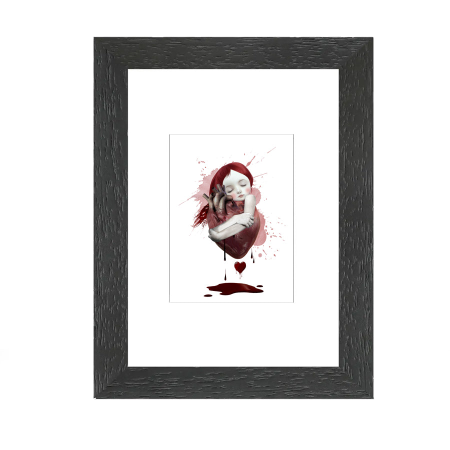 Eclectic Artist Trading Card features a surrealistic miniature art of a girl tenderly embracing an anatomical heart.
