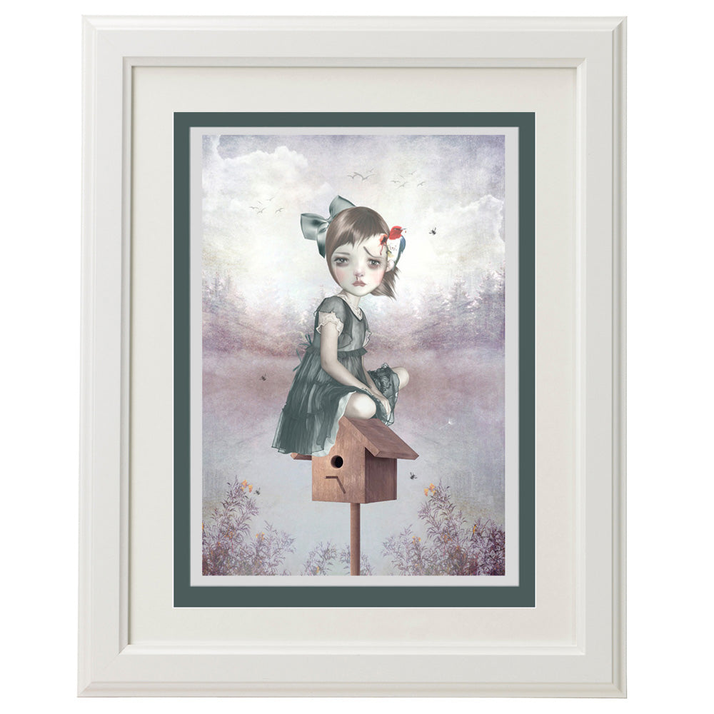 Framed greeting card featuring a surreal art print of a girl and woodpecker, elegantly displayed for a unique and artistic touch to any space.