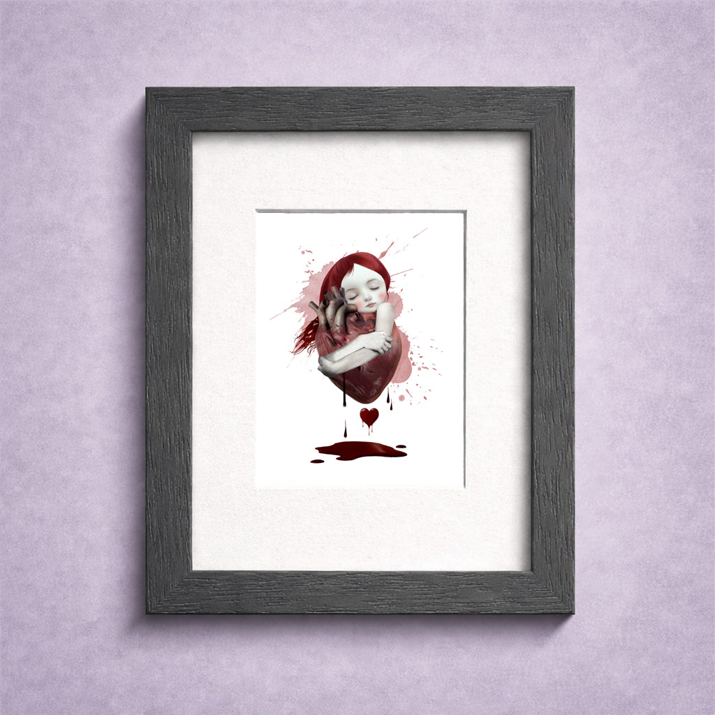 Framed ACEO card featuring a red hair girl hugging an oversized anatomical heart