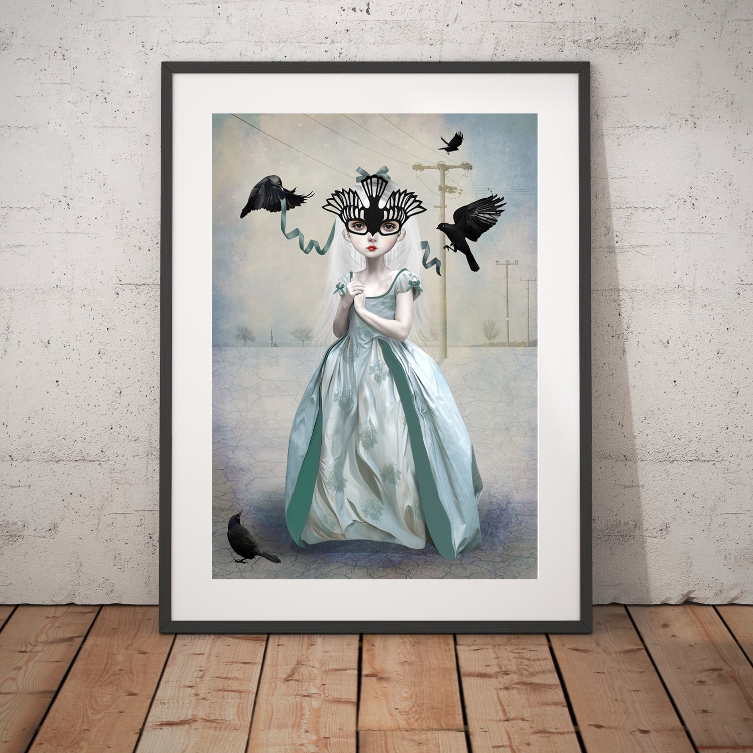 Girl and blackbird art print featuring a girl in a blue gown adorned with a blackbird mask surrounded by blackbirds. 
